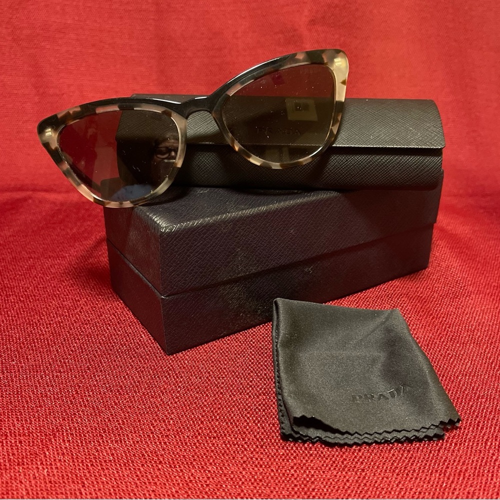 Gorgeous Pair Of Tortoise Prada Sunglasses Box and case no longer available
